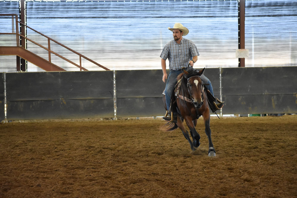 Brent_riding_in_Arena