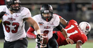 Fredi Knighten evades a Ball State defender during the GoDaddy Bowl