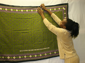 Woman pinning a blanket