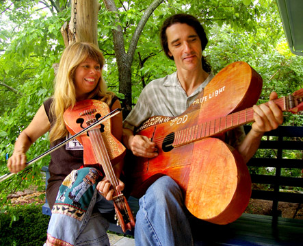 Kelly-and-Donna-on-bench-with-Stilly-instruments-web