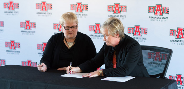 A-State-UA-Signing