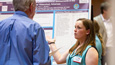 A student presents her research at last year's event.