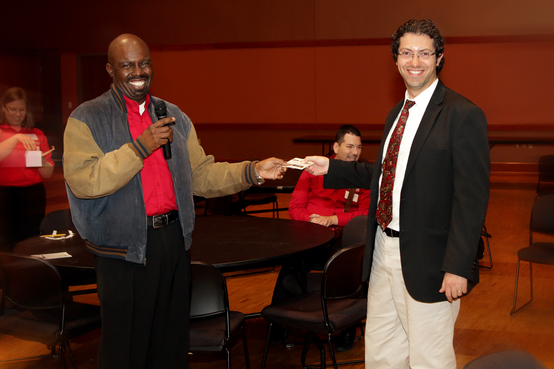 Faculty Center Director, Dr. Steve Leslie, handing out a prize to drawing winner