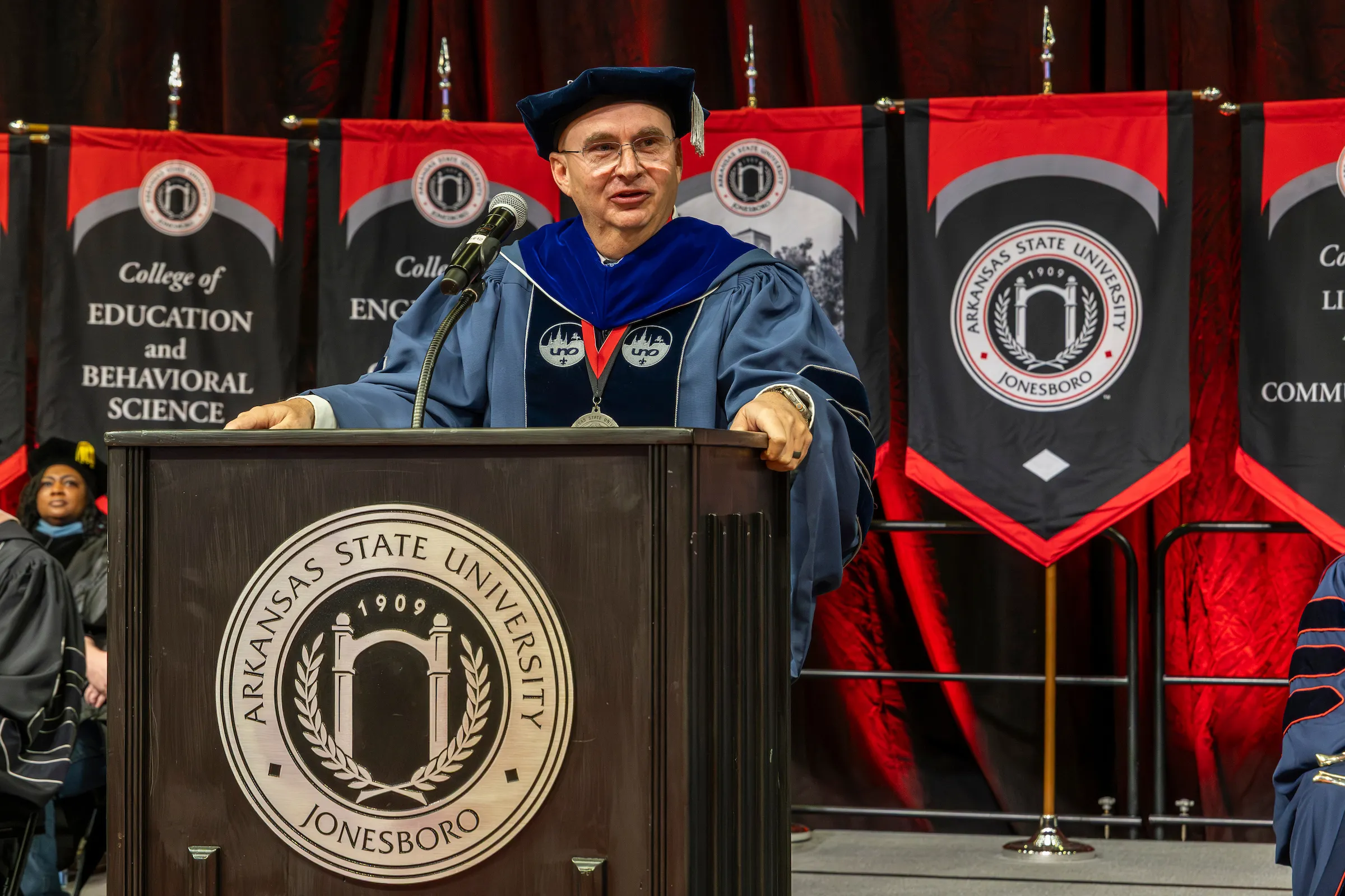 Provost Will McLean congratulates a graduate at a recent commencement ceremony.