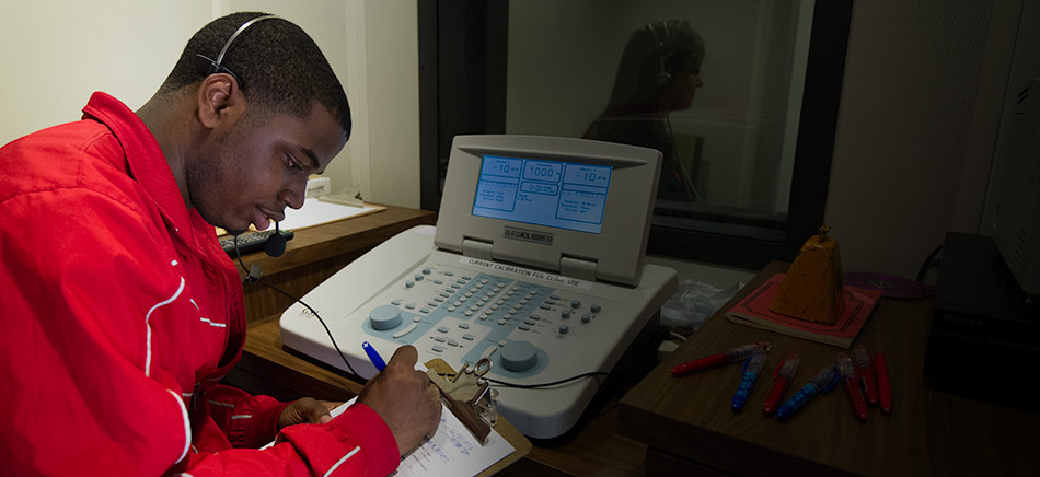 A student in a communications lab