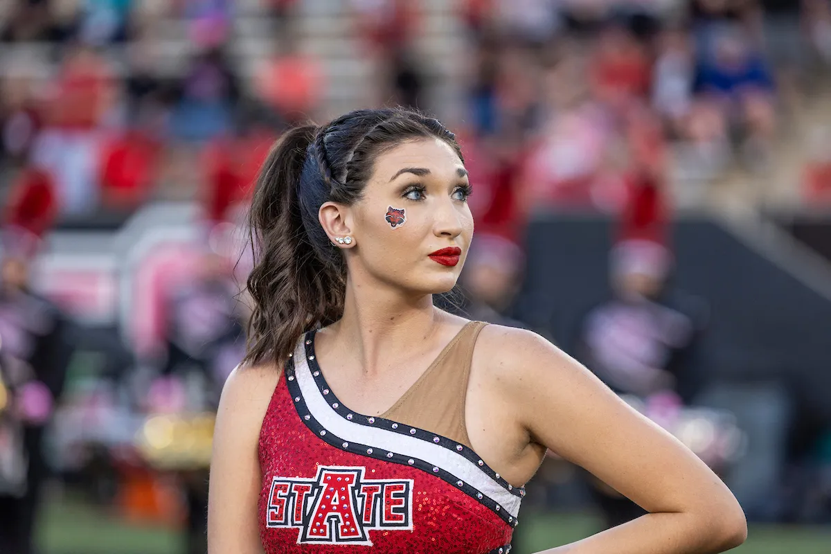 A twirler looks on to the crowd