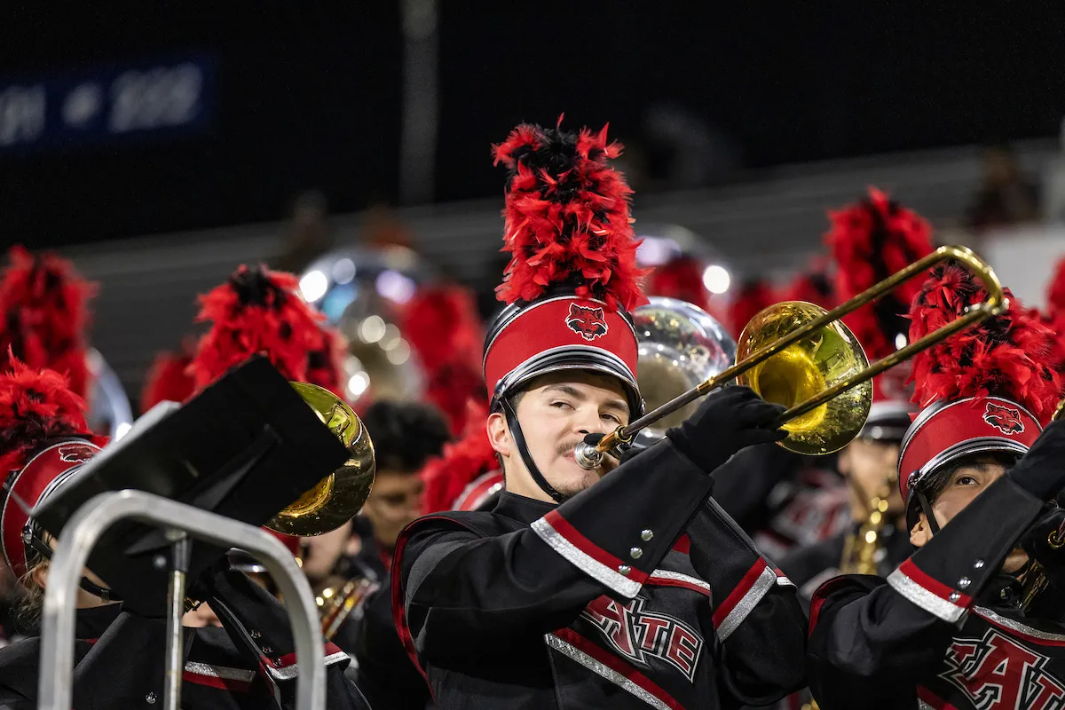 A-State trombone player performing with an ensemble.