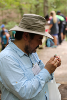 Dr. Agustin Jimenez inspecting his find during one of the guided hikes.