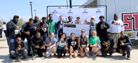 Alpha Phi Alpha Inc. fraternity members pose with winners of the inaugural Alphas for Autism 5K