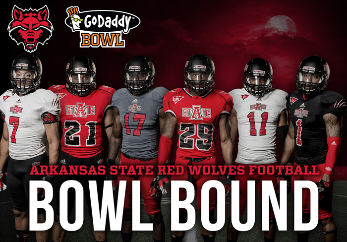 A-State Players and the GoDaddy Bowl Logo