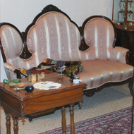 antique sofa and table in the Mary Stack Gallery