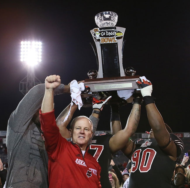 Coach John Thompson and the GoDaddy.com Trophy