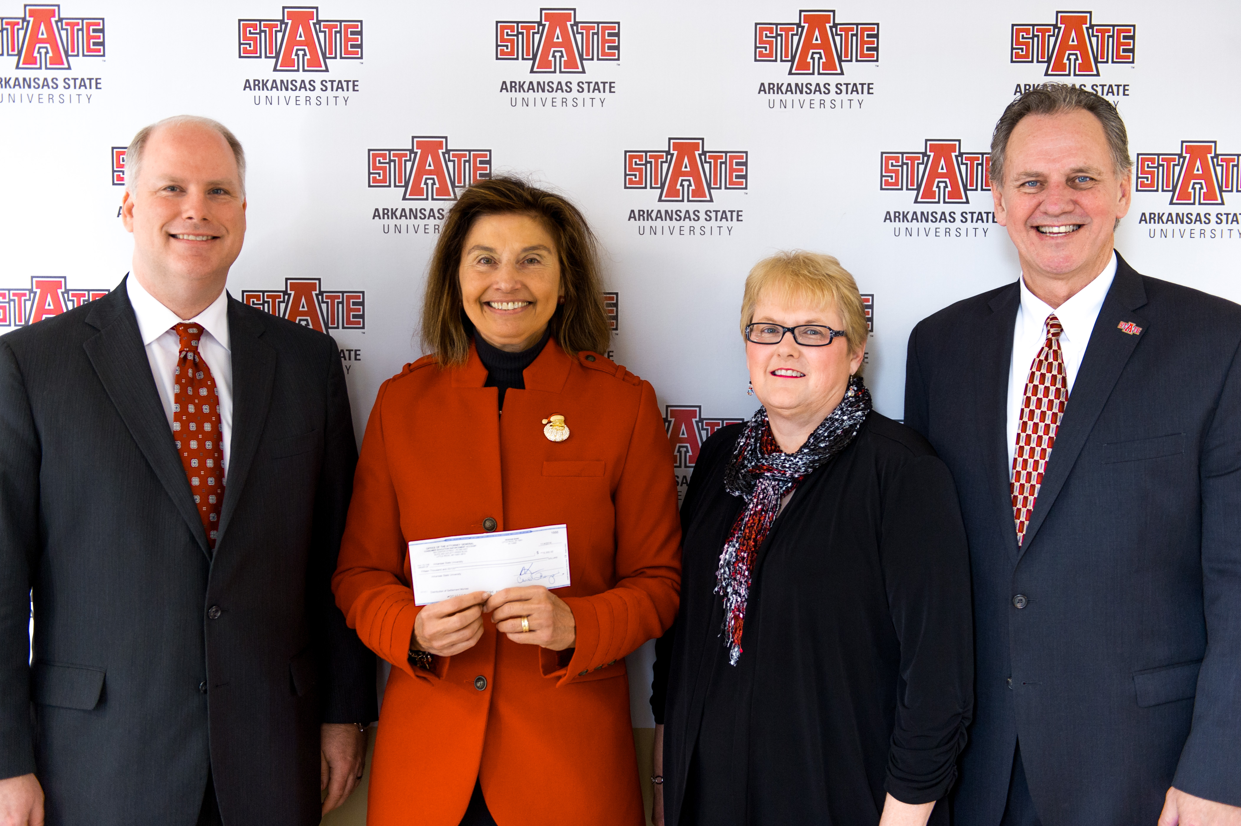 AG Presents check to Beck PRIDE