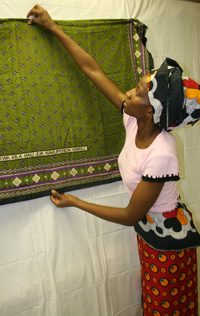 Woman Pinning a Blanket