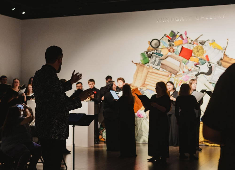 Conductor at a concert in the Bradbury Art Museum.