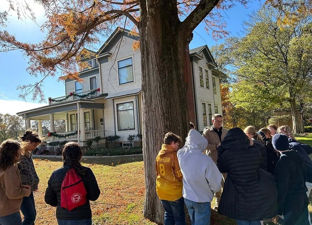 Kids on a school field trip in front of the Hemingway-Pfeiffer house.