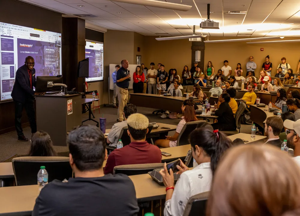 Leadership open interview event in the Dawson Economic Center with speaker and Dr. Leslie