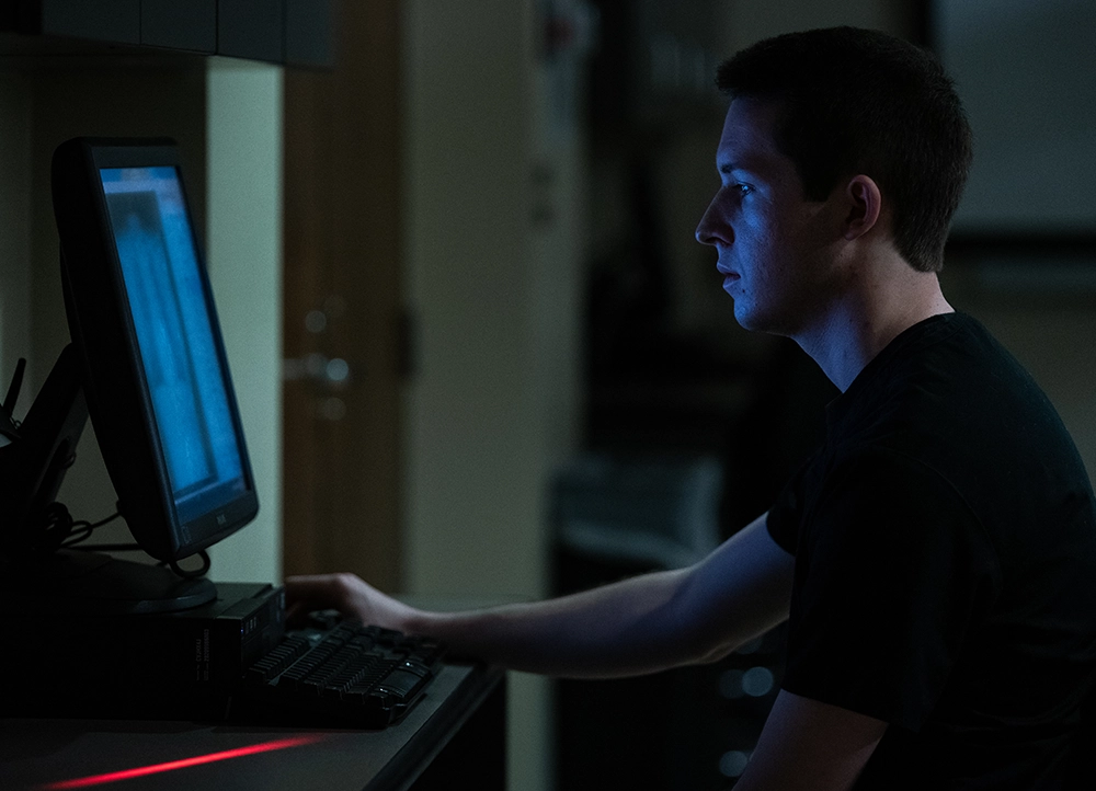 A-State radiology student looking at x-ray.