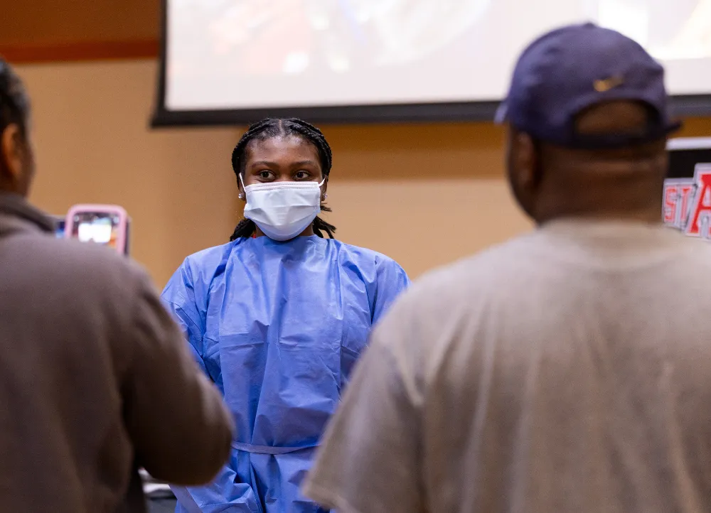 Student speaking on public health in mask