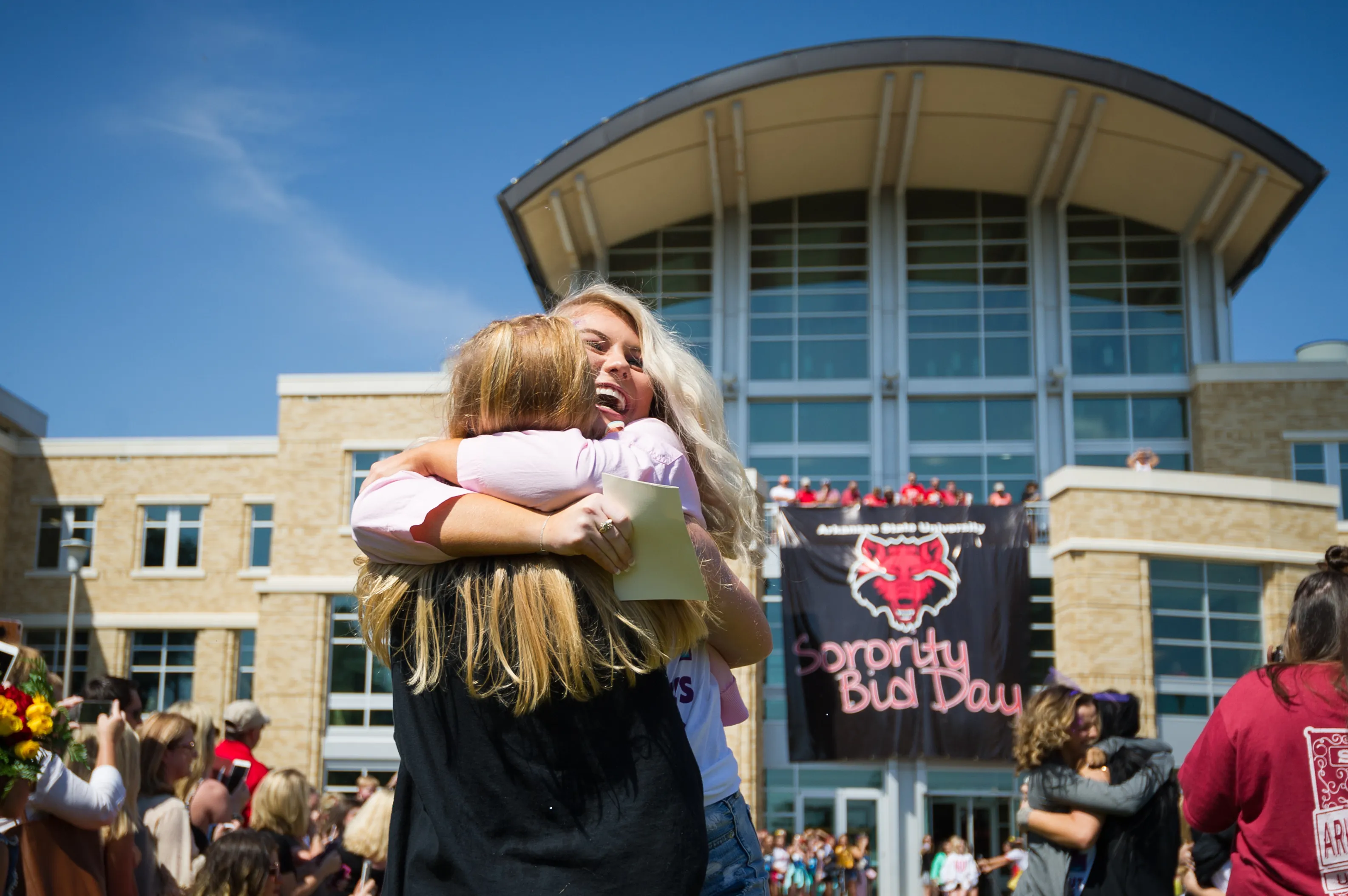 Students celebrating by student union
