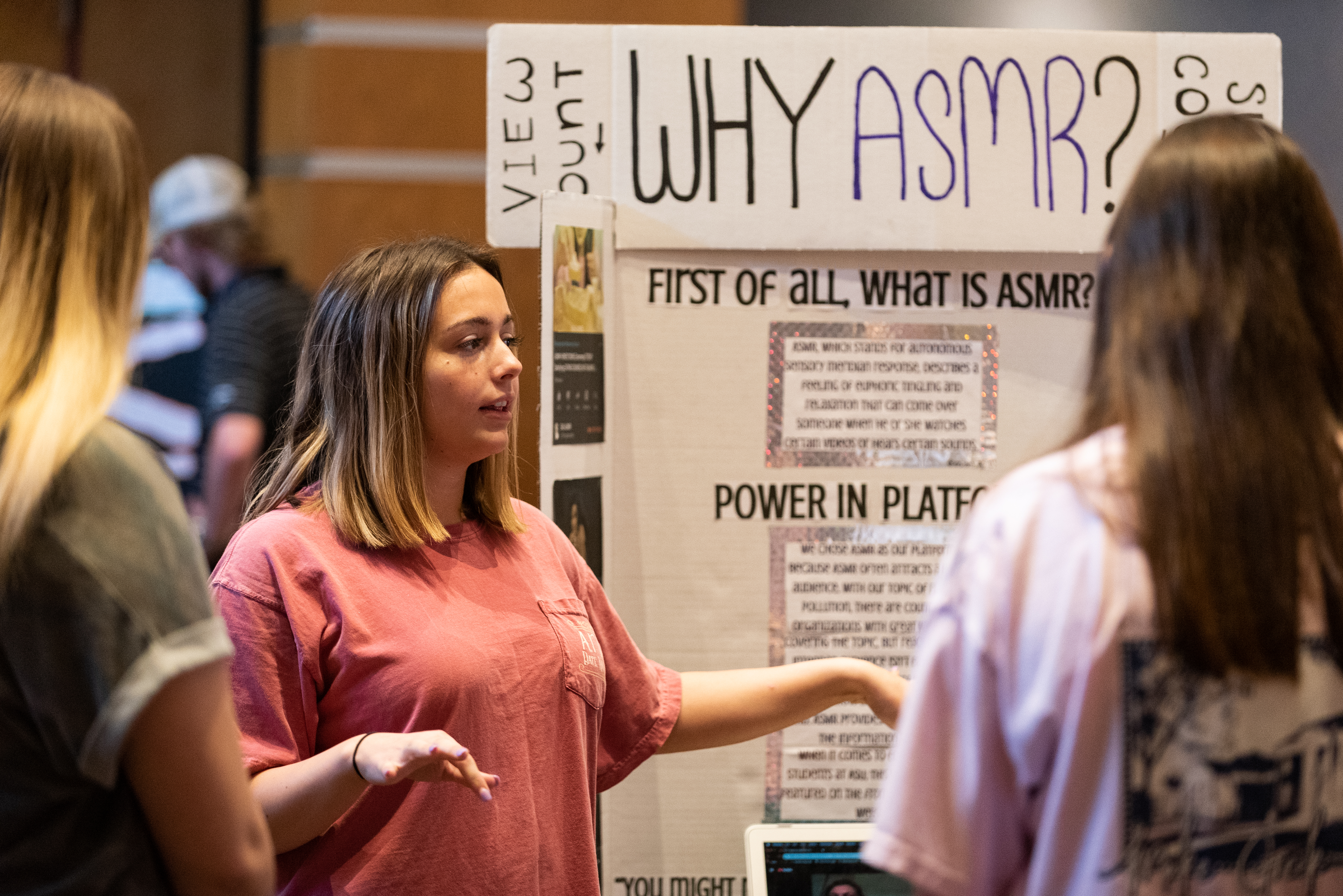 A student doing a presentation about ASMR.