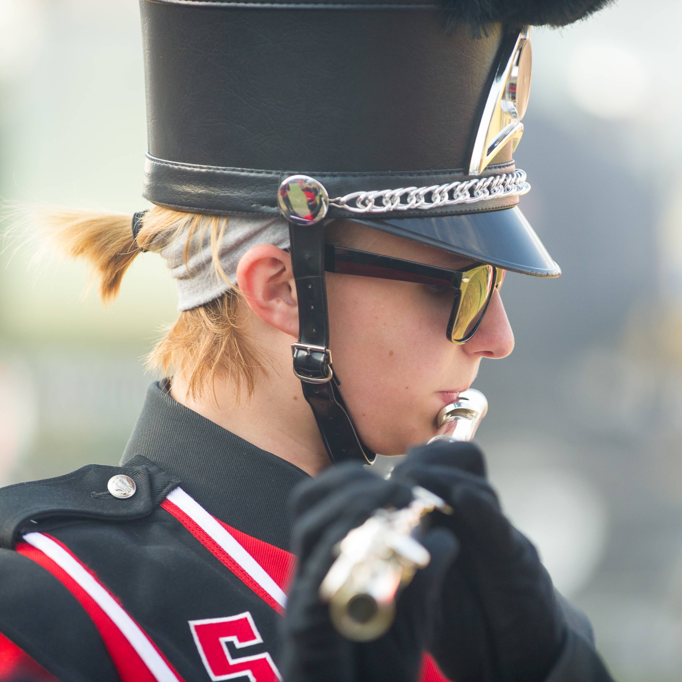 A member of the A-State Band playing the flute.