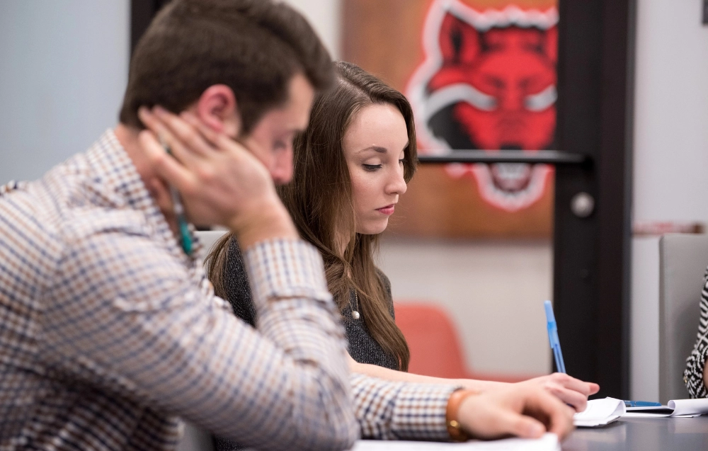 Students studying in the sales leadership center.