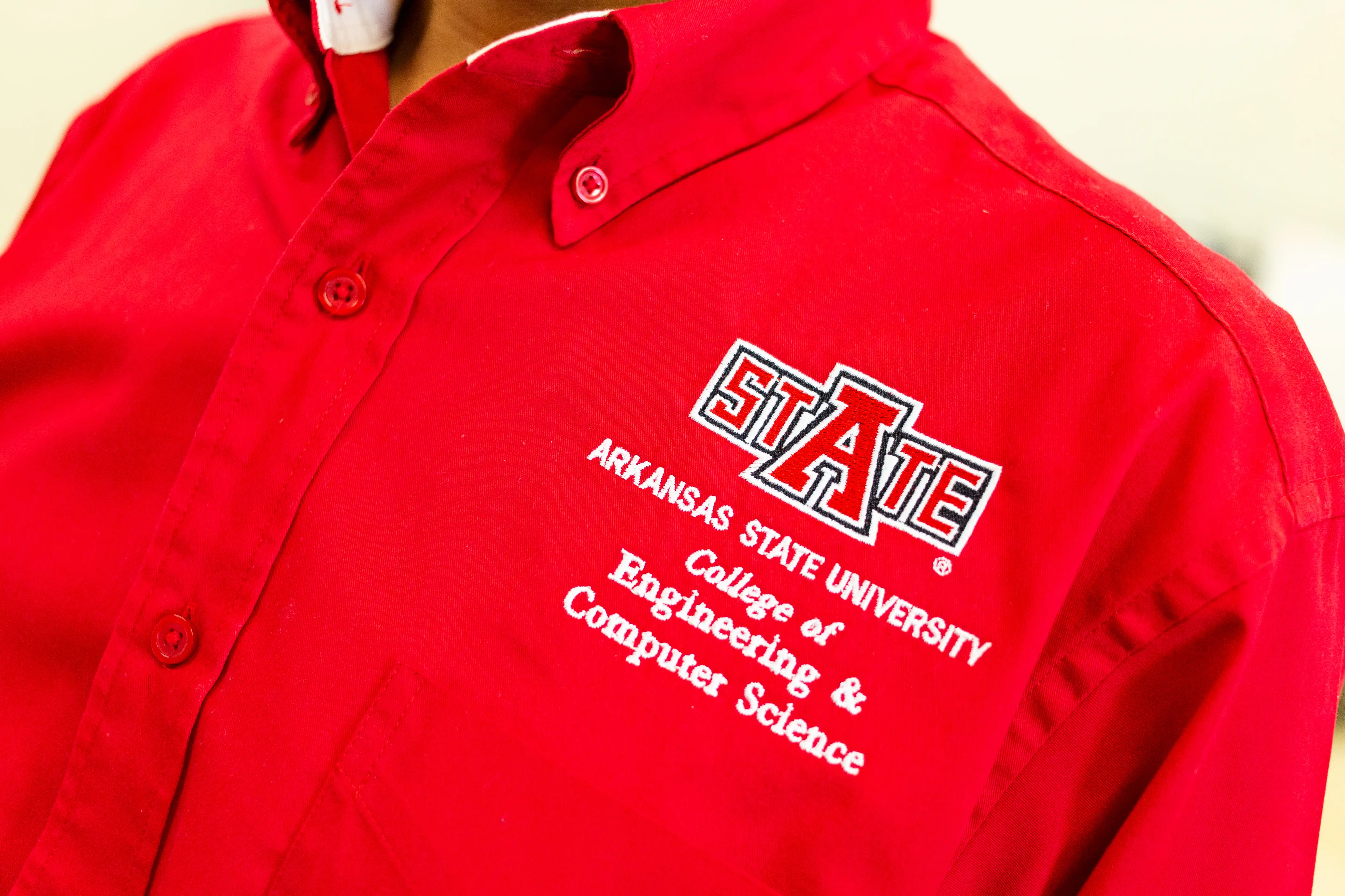 A-State shirt with College of Engineering and Computer Science on it.