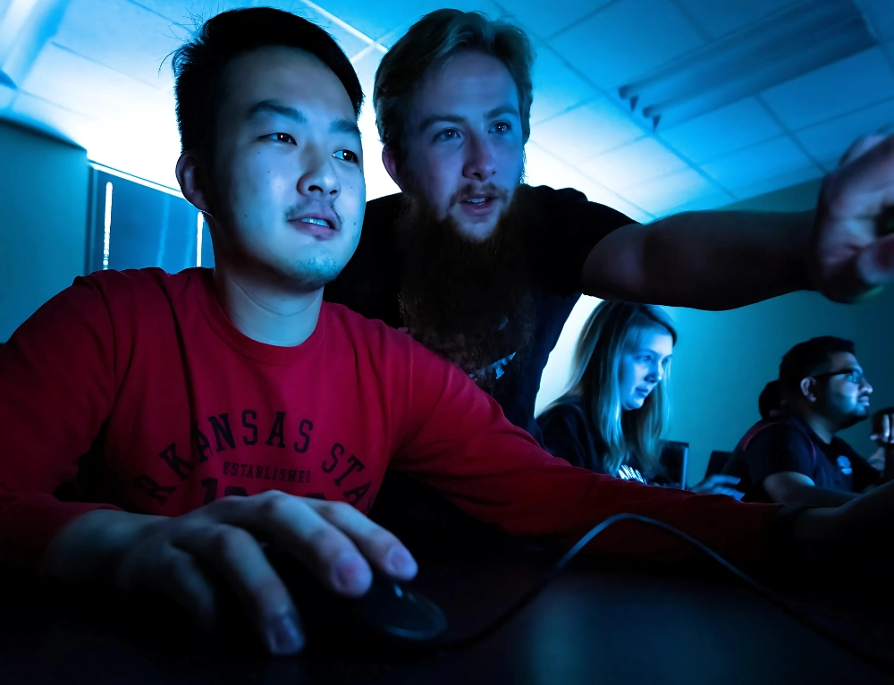 Computer Science students going over coding in class.