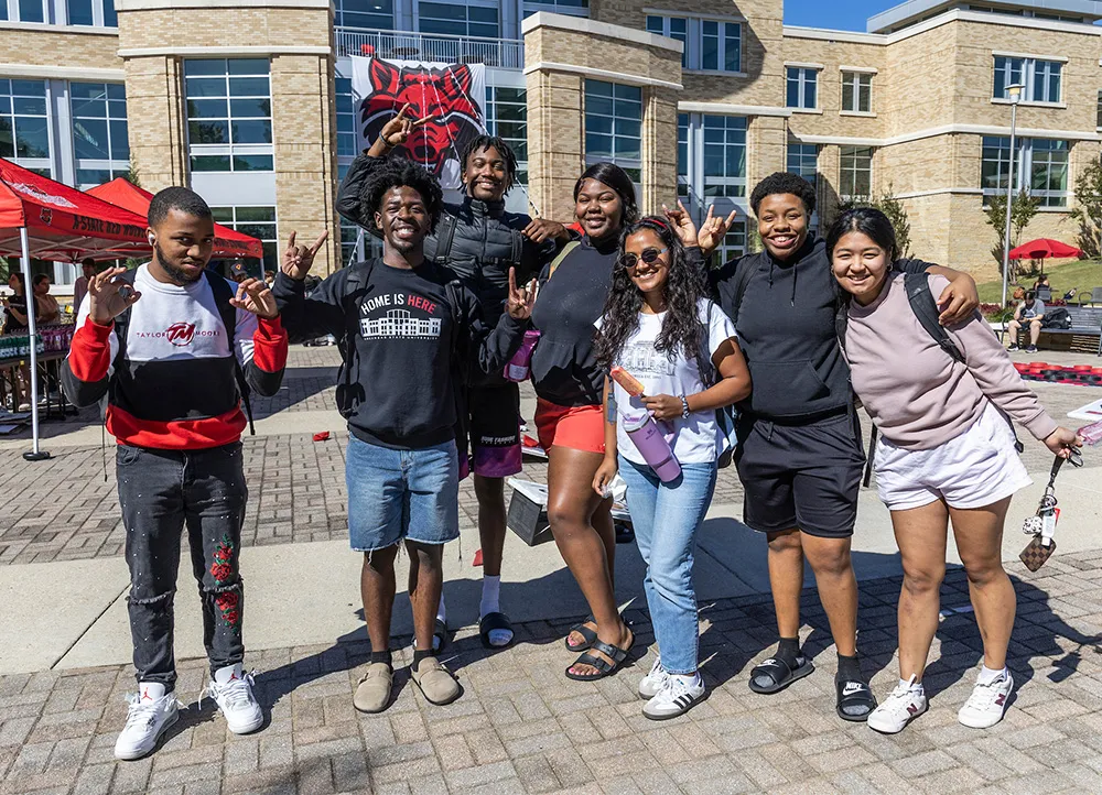 Students pose for a photo on Heritage Plaza