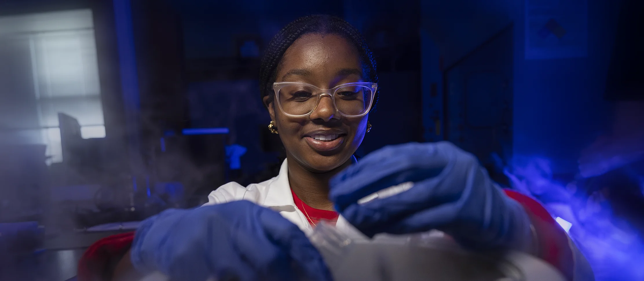 A student experimenting with dry ice.