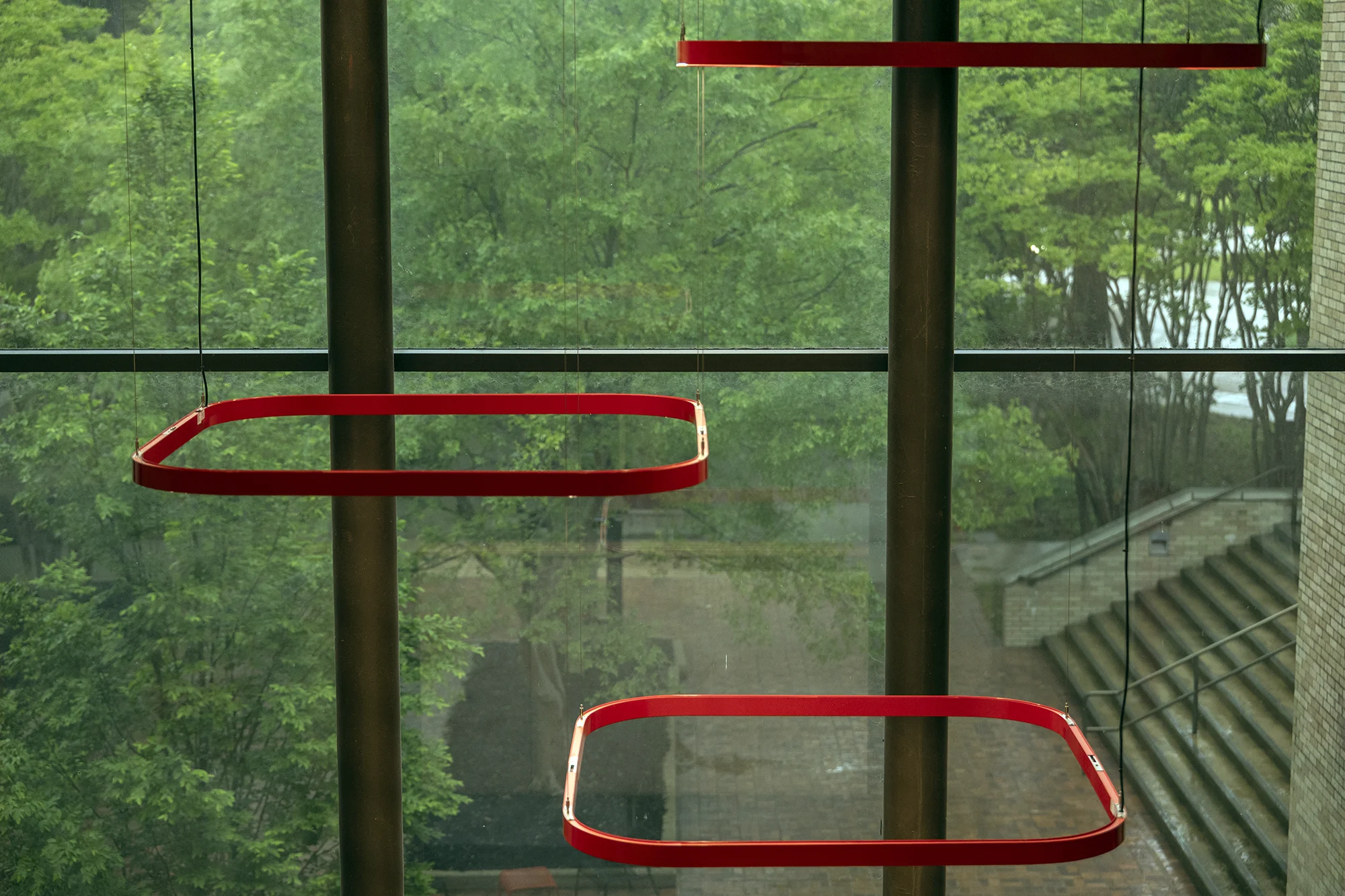 Hanging red decorations in the Education and Communications building.