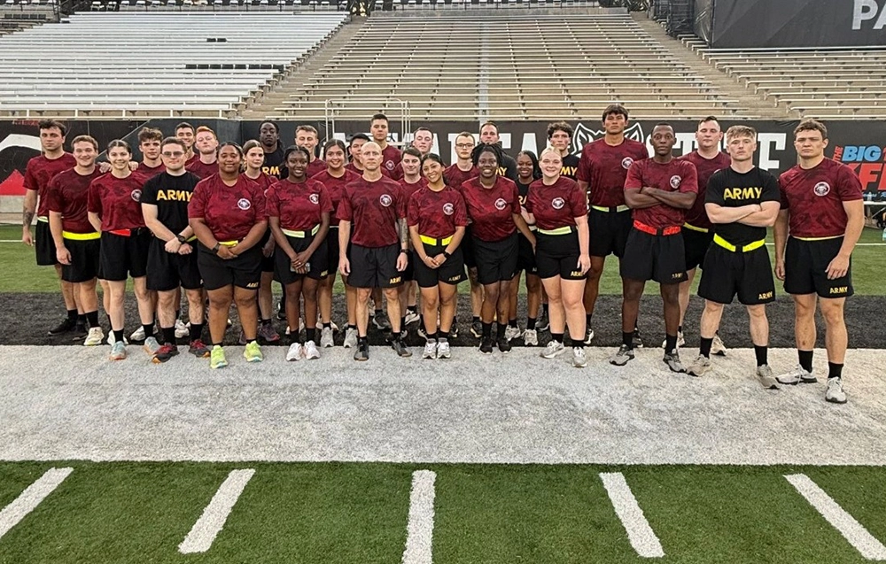 ROTC students standing on the football field.