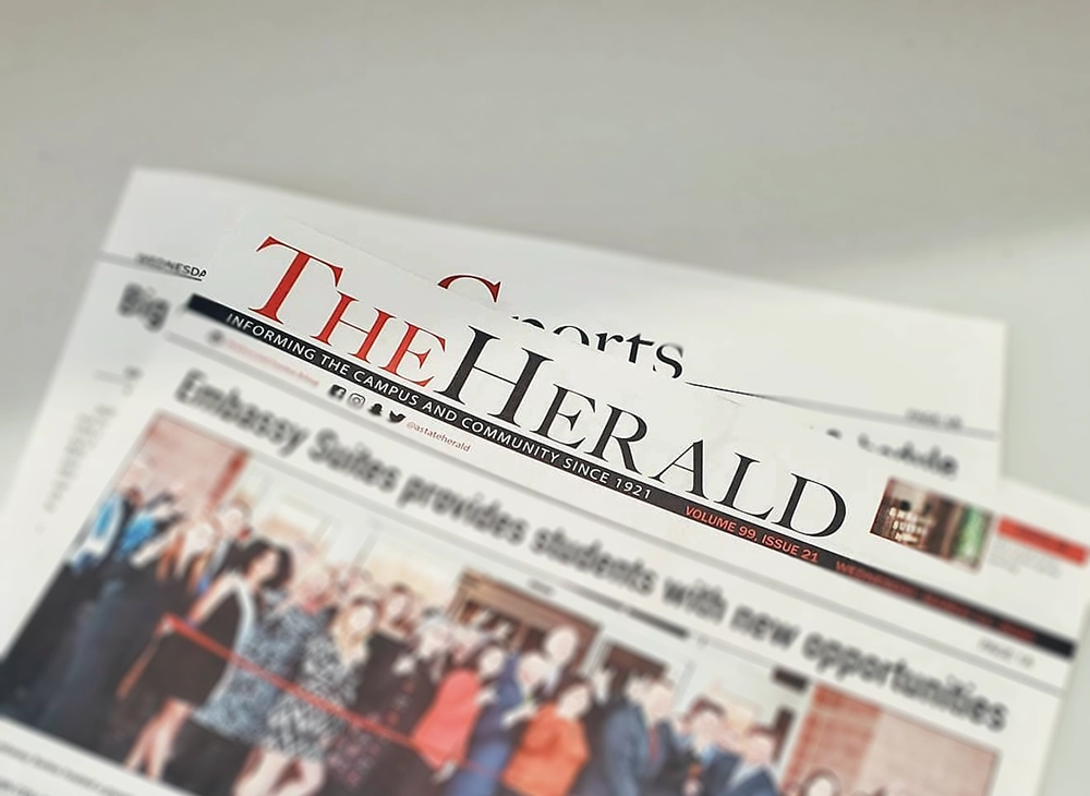 A close-up of The Herald newspaper.