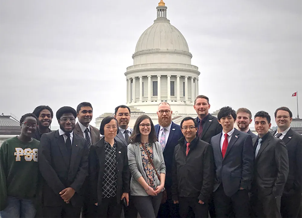 Center for No-Boundary Thinking group photo in front of the Arkansas capital building