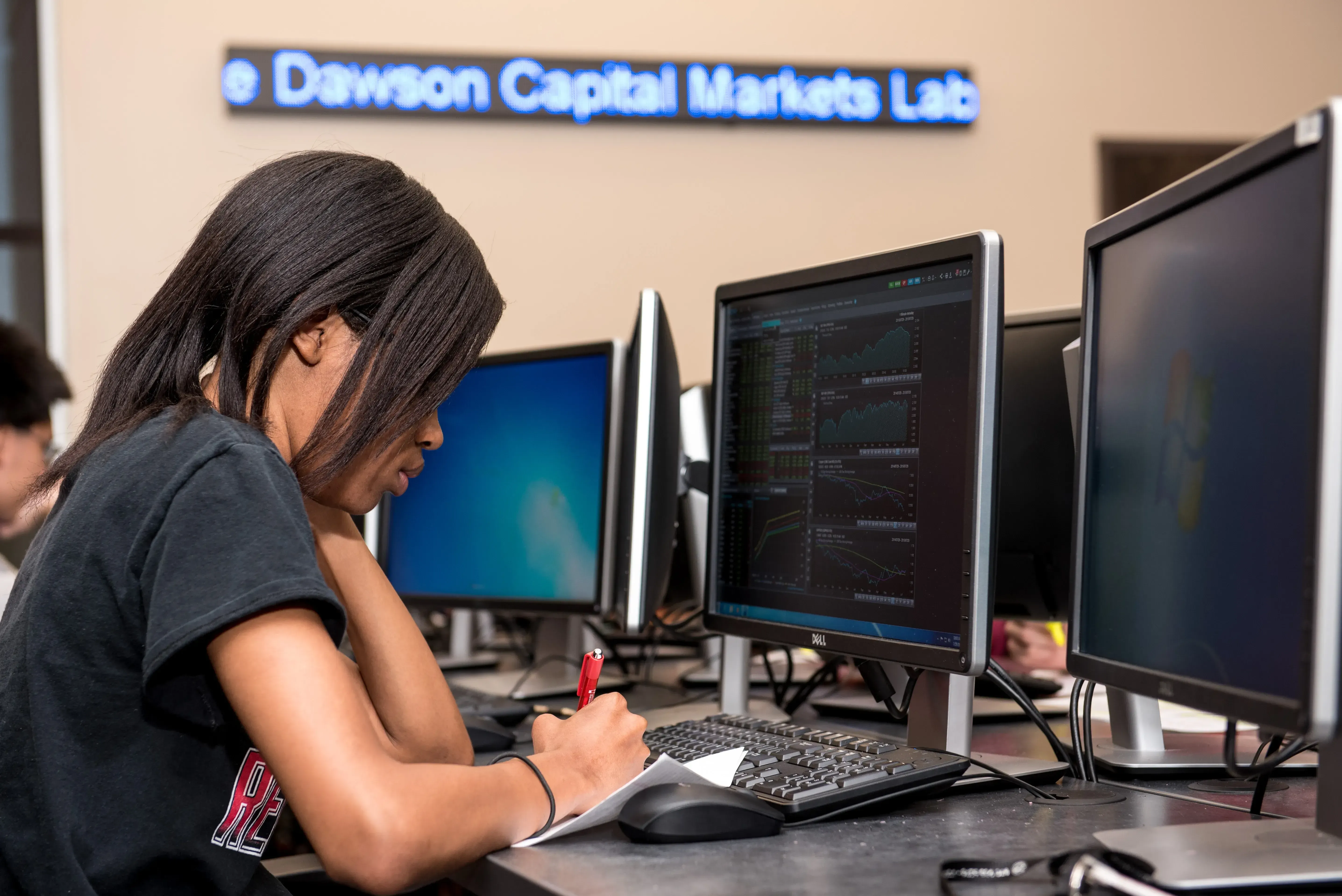 A-State students working in the computer lab on business analytic course