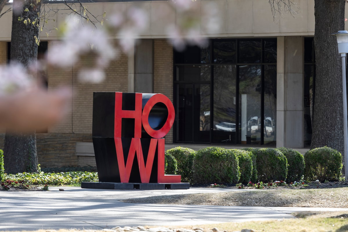Red and black “HOWL” sculpture, located right outside the Administration Building.