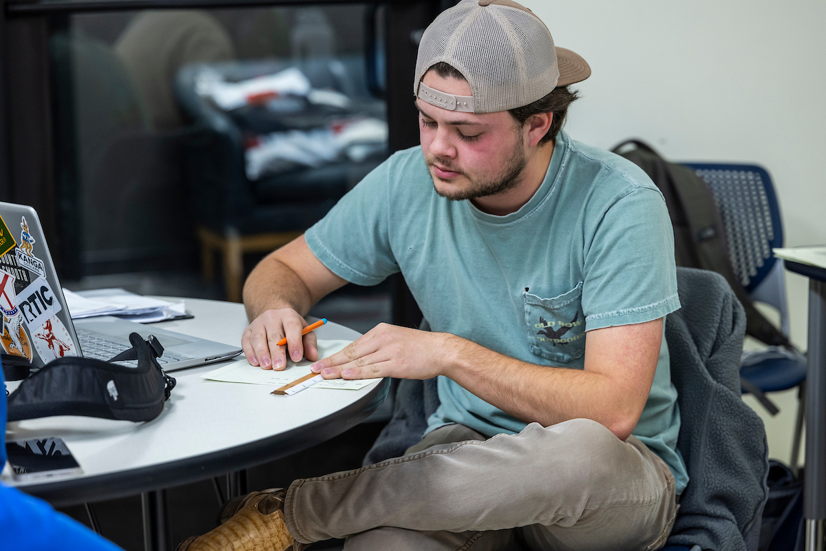 An A-State student studies for an upcoming exam in the Dean B. Ellis Library.