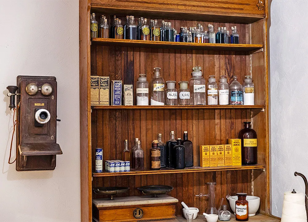 old drugstore with antique phone on the wall