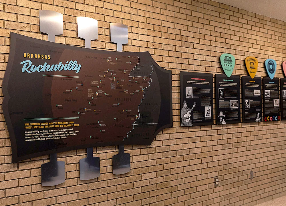 wall display showing Rockabilly history in Arkansas