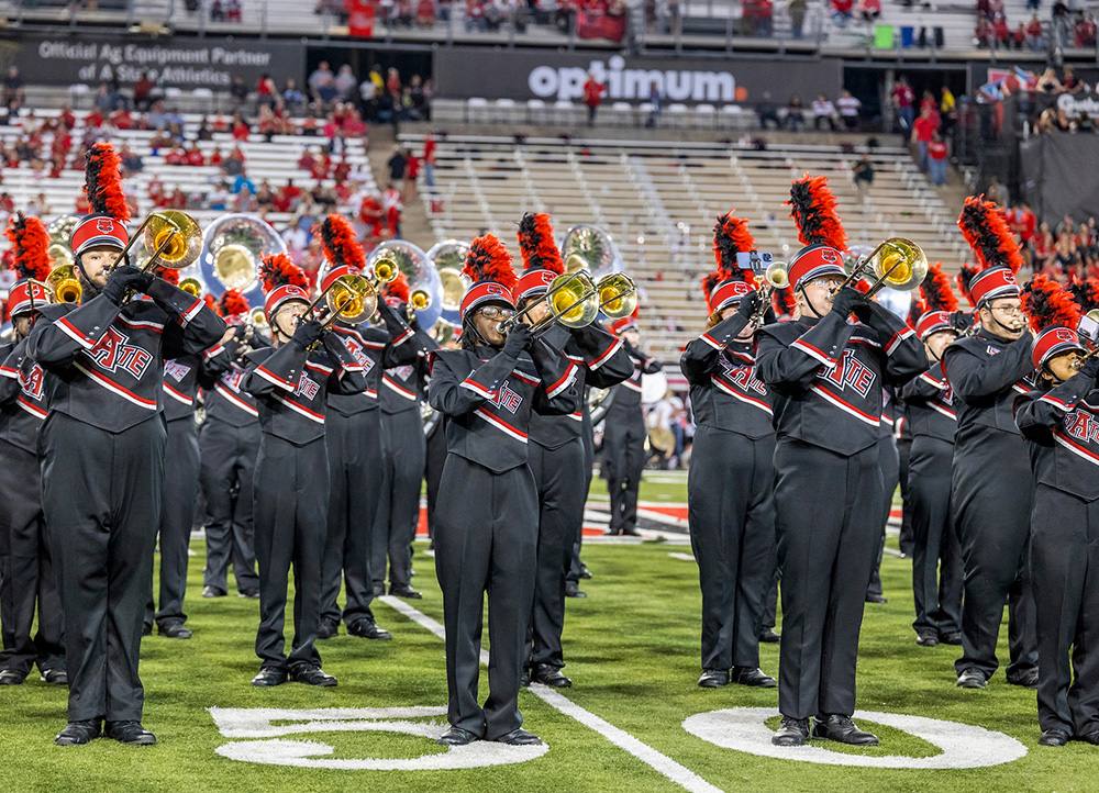 marching band playing on the football field