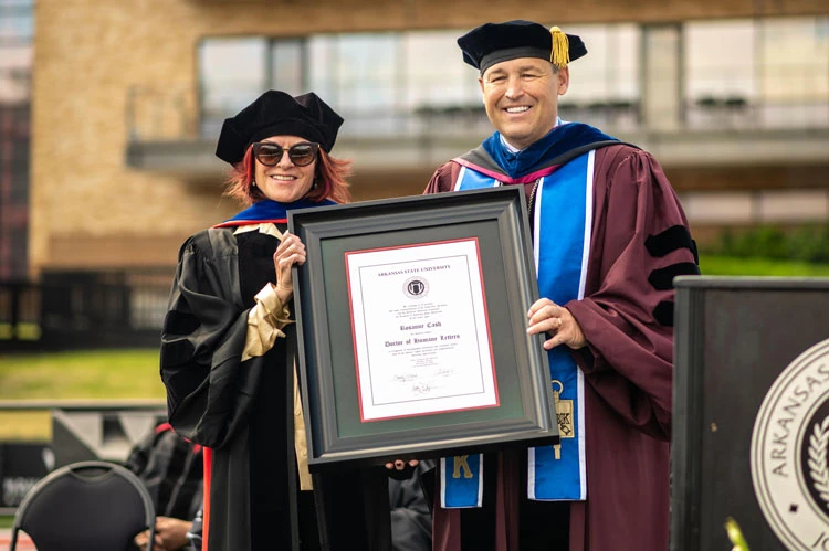 Rosanne Cash accepts honorary doctorate from Chancellor Kelly Damphousse