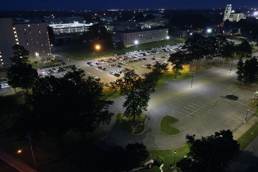 Aerial view of parking lots NW-1A and NW-1B, with Kays Hall at top left, and Dean B. Elllis Library at top right.