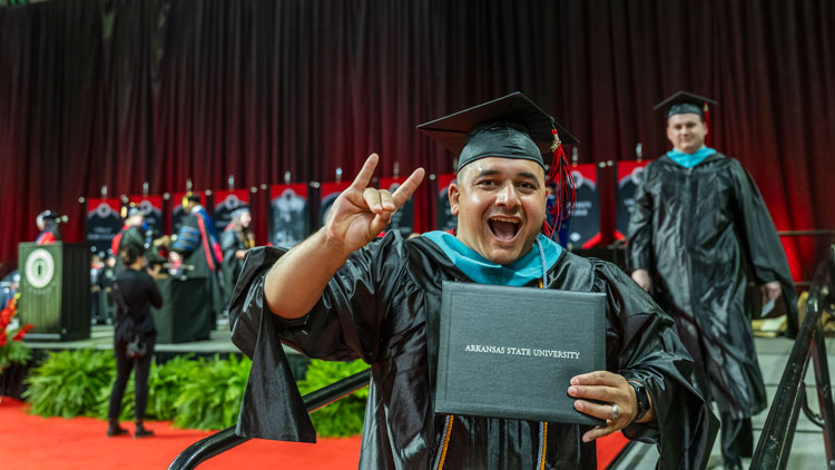 A-State graduate during a previous university commencement exercise.&nbsp;