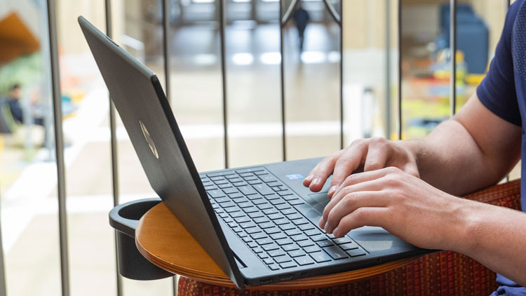 person uses a laptop