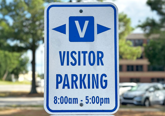 Visitor parking sign