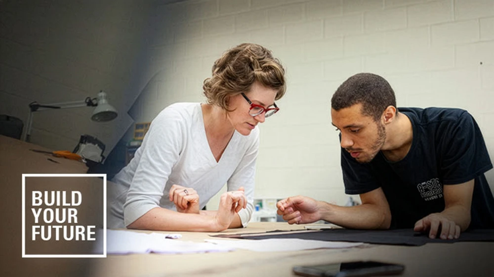 Professor assists student with costume design
