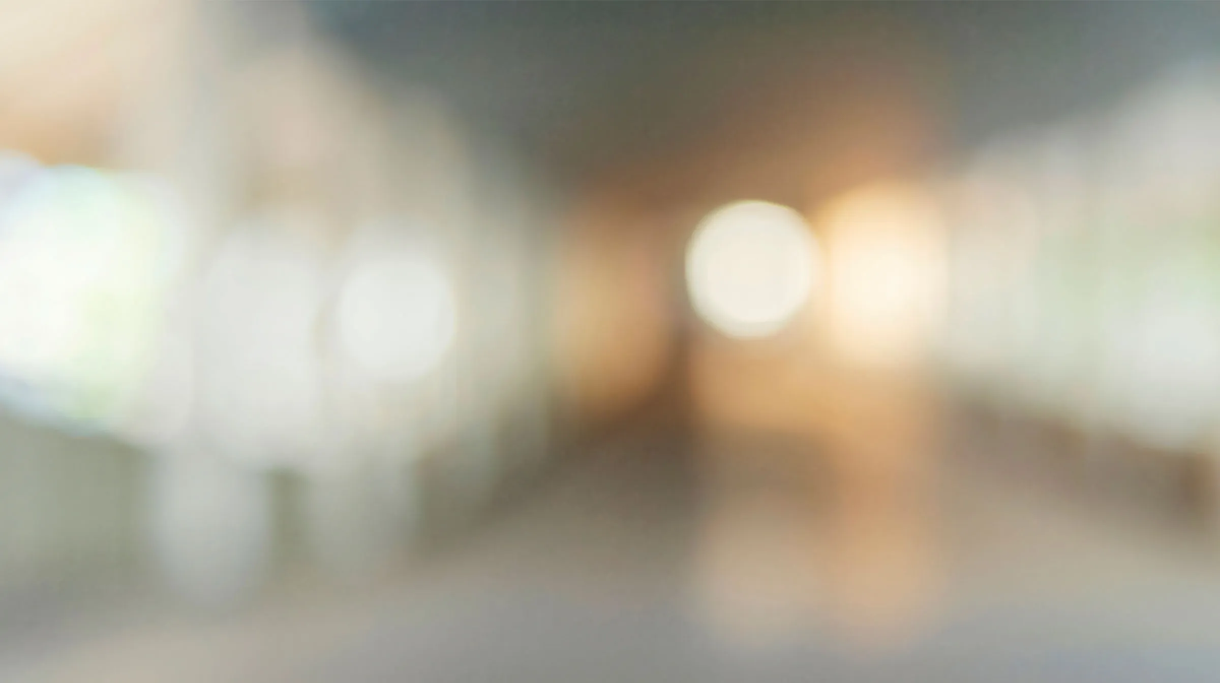 abstract background image with blurred gray, green and orange colors