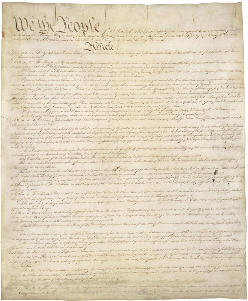 A photo of the first page of the Constitution