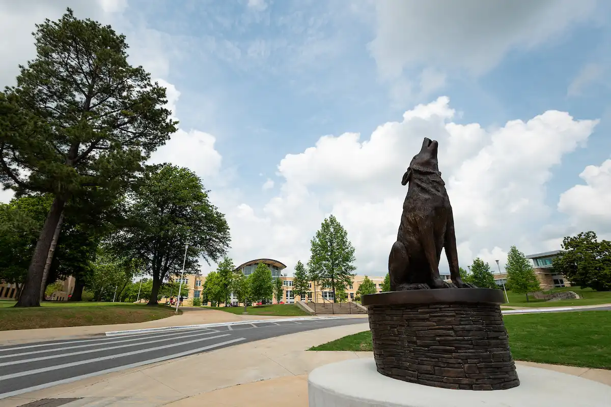 Wolf statue in front of Reng Student Union.